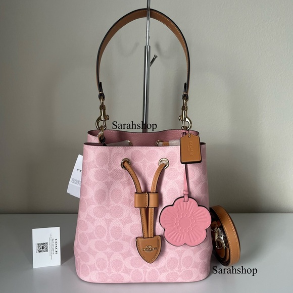 Coach Handbags - ✅Coach Rowan Bucket Bag In Signature Canvas With Charms